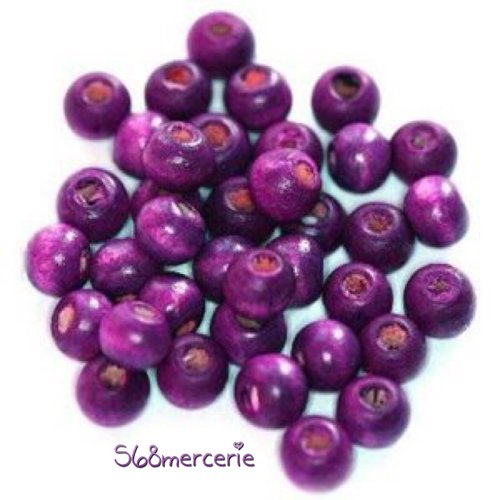 30 perles en bois violet , 7x8mm