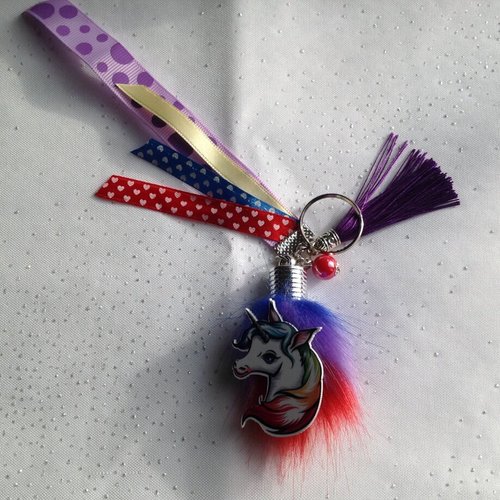 Vendu porte clé ou bijoux de sac pompon multicolore cabochon licorne 