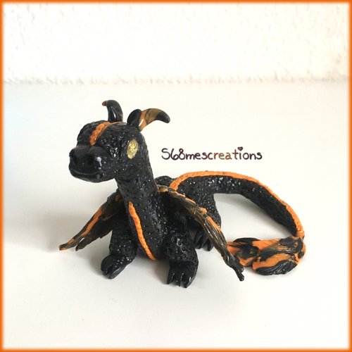 Figurine dragon noir/orange en fimo