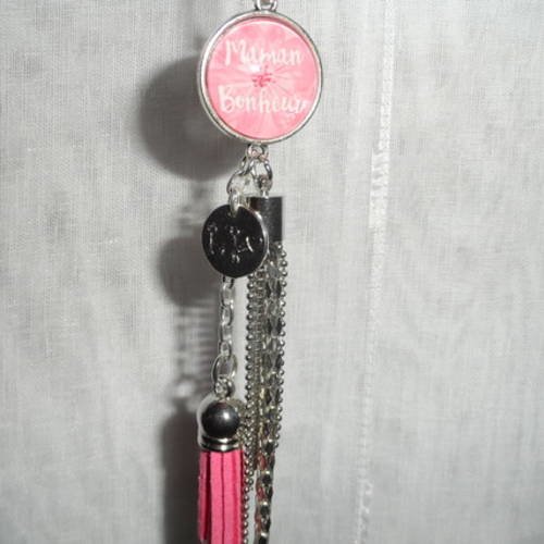 Porte clés / bijou de sacs cabochon " maman bonheur " métal argenté et pompon rose 