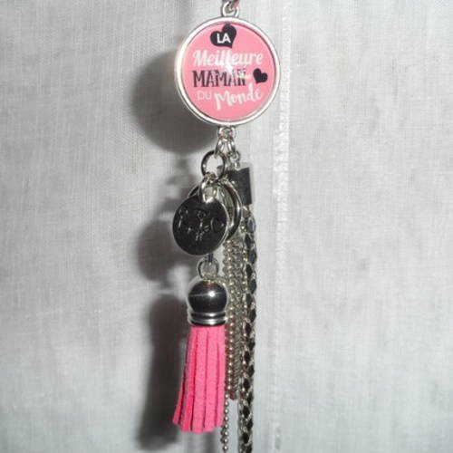 Porte clés / bijou de sacs cabochon " la meilleure maman du monde " métal argenté et pompon rose 