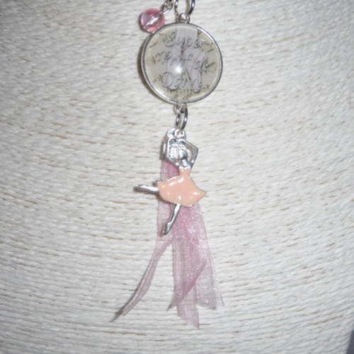 Porte clés / bijou de sacs cabochon " super prof de danse " avec breloques et petits rubans roses. 
