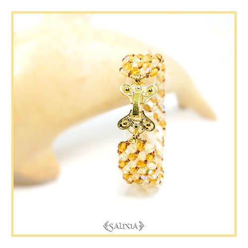 Bracelet nora esprit ambre baltique perles de bohème aurore boréale fermoir à clip déployant (#bc156)