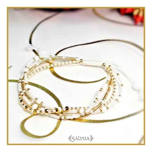 Vendu - bracelet 4 rangs lorenza perles plaquées or 24 carats, rocailles blanches et dorées, fermoir lien coulissant macramé (#bc280)