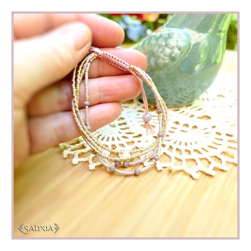 Bracelet 4 rangs lorenza perles plaquées or 24 carats rocailles mauve ab et dorées fermoir lien coulissant macramé (#bc338)