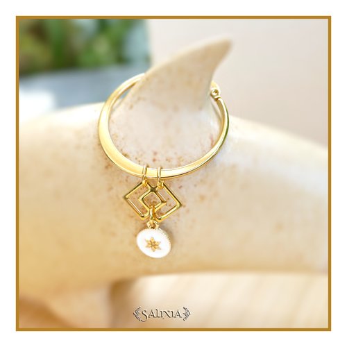 Boucles d'oreilles créoles breloque fleur étoilée acier inoxydable doré (#bo781)