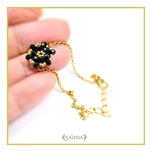 Bracelet "black flower" fleur tissée perles noires perles japonaises dorées chaine et mousqueton acier inoxydable doré (#bc418 p263)