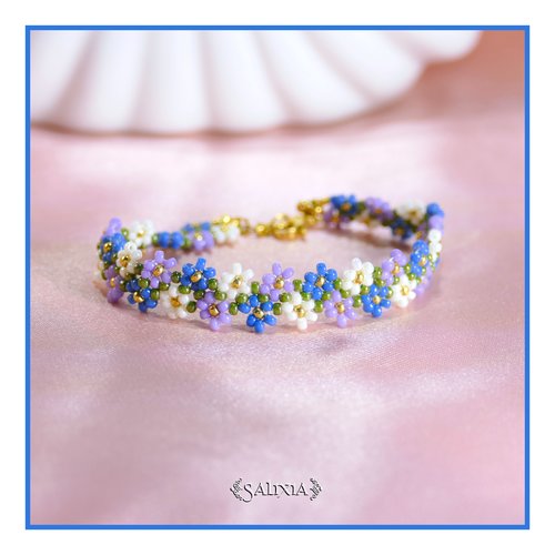 Bracelet frise petites fleurs tissé à l'aiguille en perles de verre japonaises mousqueton acier inoxydable doré (#bc491)