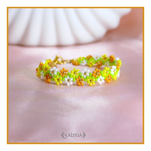 Bracelet frise petites fleurs tissé à l'aiguille en perles de verre japonaises mousqueton acier inoxydable doré (#bc492)