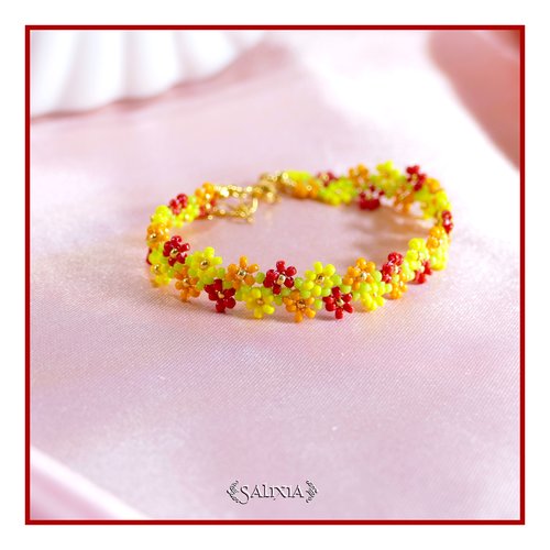 Bracelet frise petites fleurs tissé à l'aiguille en perles de verre japonaises mousqueton acier inoxydable doré (#bc493)