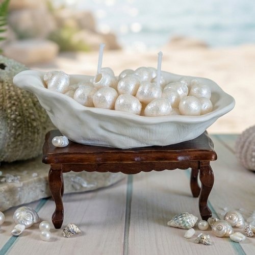 Bougie artisanale coquillage & perles nacrées - une évasion marine unique.