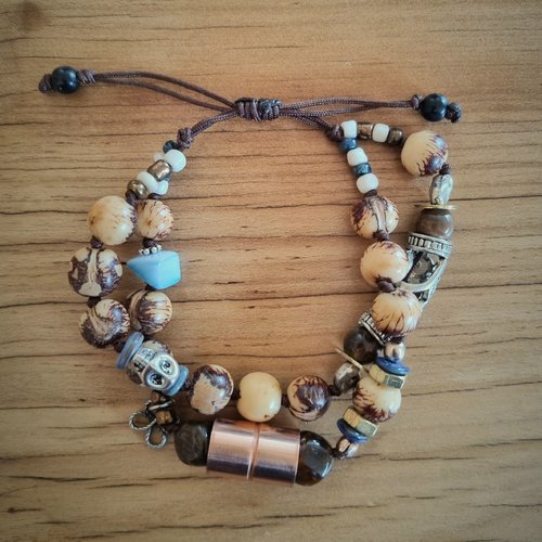 Bracelet homme hippie steampunk, en perles naturelles, manchon de cuivre et tête de mort