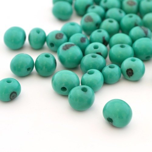 10 perles rondes vert émeraude en graines d'açaï 6-10mm