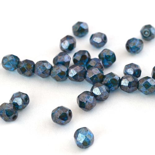 25 perles en verre bleu capri à facettes 6 mm