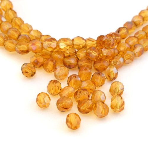 25 perles en verre ambre à facettes 6 mm