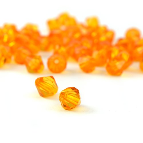 50 perles toupies orange transparentes 8mm en plastique