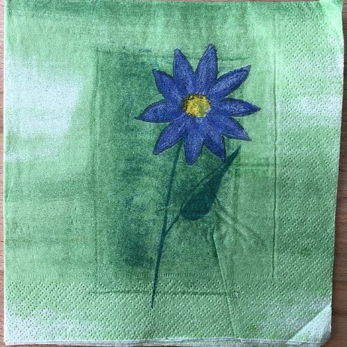 Serviette en papier "fleur bleue sur fond vert"