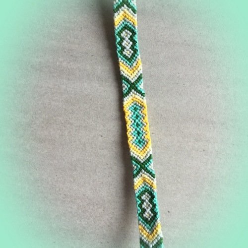 Bracelet brésilien motifs ethniques jaune et vert en coton