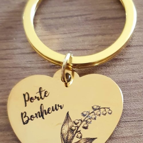 Porte cles "porte bonheur" en inox doré