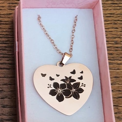 Pendentif coeur en inox doré rose "fleurs et papillons"