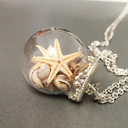 Collier avec des coquillages de mer bijou avec une étoile de mer collier avec un globe de verre