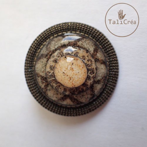 Broche bronze ronds superposés en sables naturels jaune, marron