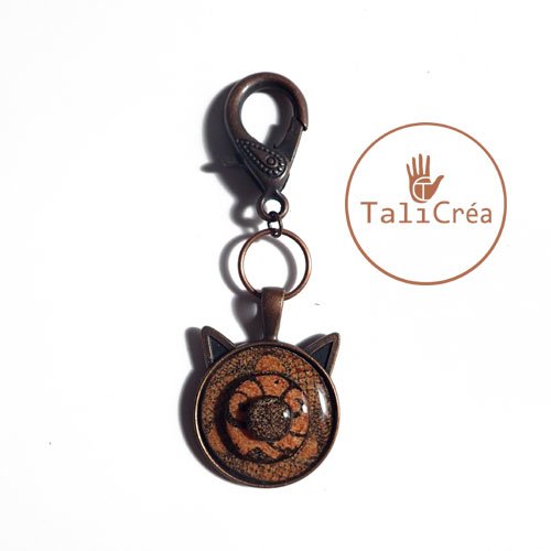 Porte clef chat cuivre et sables orange marron