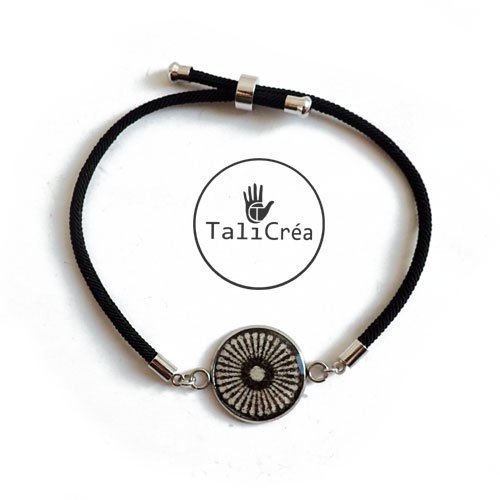 Bracelet noir et blanc en acier sur cordon réglable