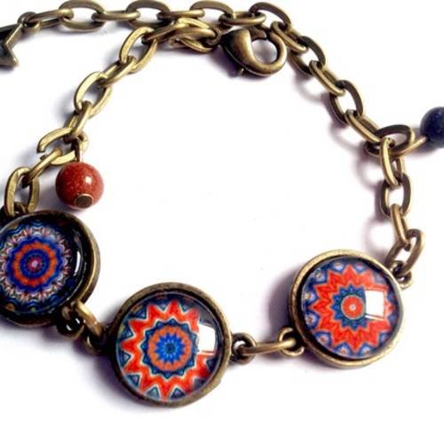 Bracelet, cabochon, mandala, kaléidoscope tons oranges et bleus. perles et breloque, en bronze. 