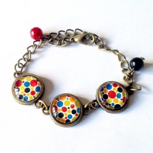 Bracelet cabochon, pois rouge, bleu, noir et jaune, chaîne en bronze, perles. 