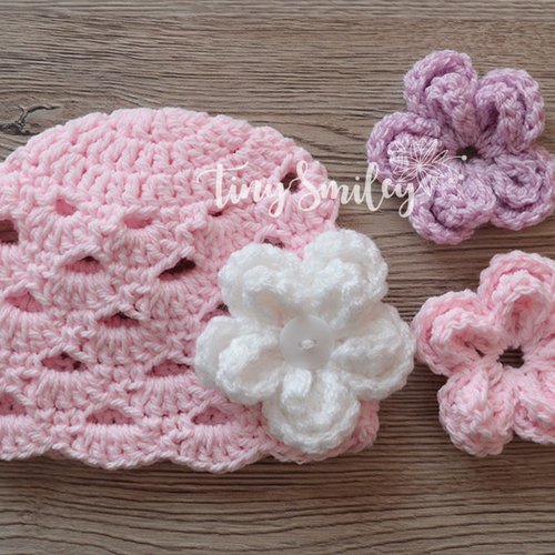 Bonnet bébé rose avec des fleurs interchangeables