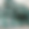 Chutes tissu fond vert motifs tasses theieres 