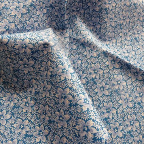 Tissu fleuri - coupon de tissu en coton, fond bleu avec impression fleurs blanches 