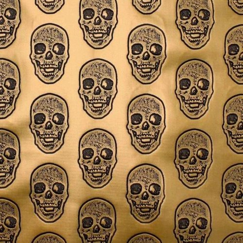 Simili cuir têtes de mort doré et noir 50x70cm