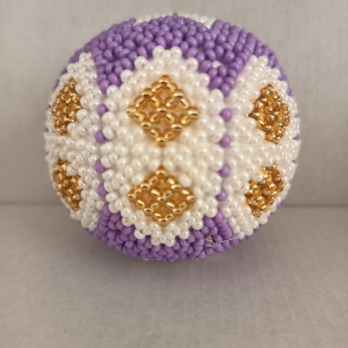 Explication pour realiser une boule en tissage danois