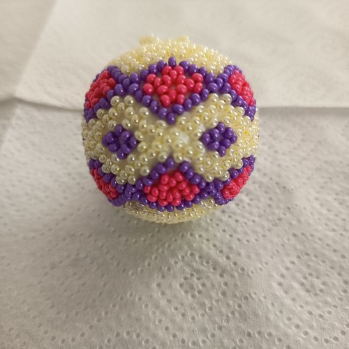 Explication pour realiser une boule en tissage danois