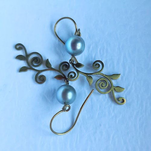 Boucles d’oreilles arabesques perles de tahiti - acier inoxydable doré – toke de perles