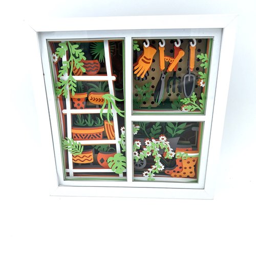 Boite lumineuse jardinage dans cadre en bois blanc