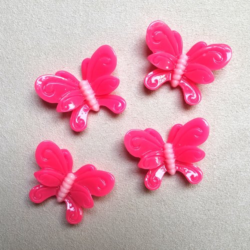 4 cabochons roses forme papillon