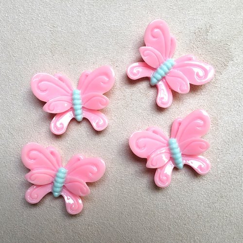 4 cabochons roses forme papillon