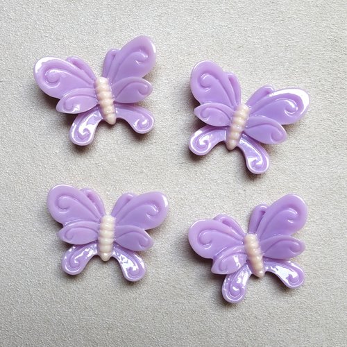 4 cabochons mauves forme papillon