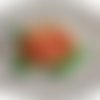 Ecusson motif fleur coloris dégradé orange et vert, thermocollant 