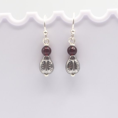 Boucles d'oreilles audra coccinelle avec ambre cerise baltique acier chirurgical et argent massif