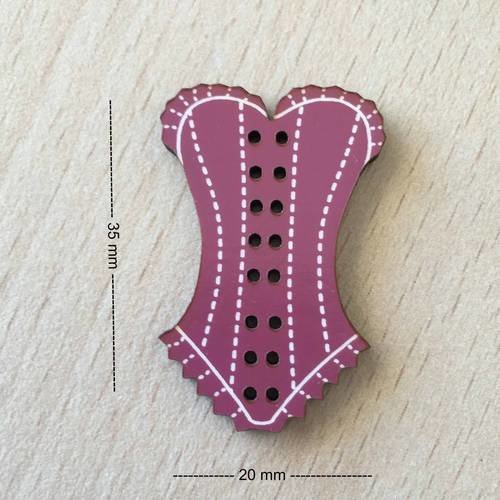 Joli petit bouton " corset dentelle rose " 