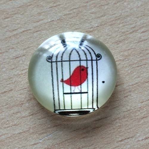 Joli pendentif cabochon en verre motif oiseau en cage 