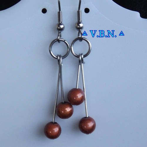 Boucles d'oreilles avec perles magique de 6mm couleur marron 