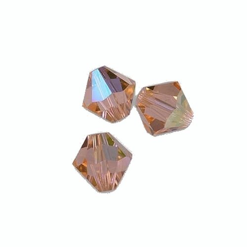 50 perles toupies - 4 mm - light peach ab