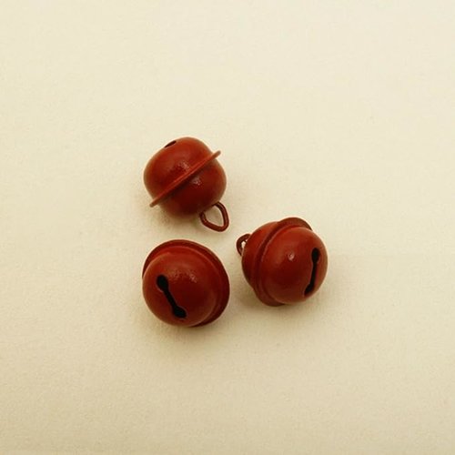 10 grelots de couleur bordeaux. diamètre: 2 cm. objet décoratif, tinte peu.