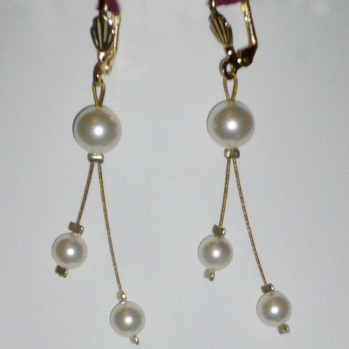 Boucles d'oreilles étincelle ivoire et doré. bijoux mariage en cristal de swarovski.