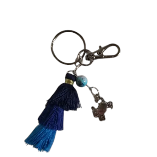 Porte clé avec pompon bleu crabe